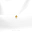 a close up of a gold ring on a white cloth