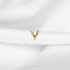 a white cloth with a gold deer head on it
