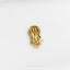 a gold colored pin with a jellyfish on it