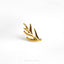 a gold ring with a leaf design on it