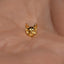 a close up of a person's hand with a gold nose ring