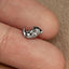 a close up of a person's finger with a ring on it