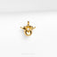 a gold pendant with a crown on top of it