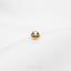 a gold ring with a smiley face on it