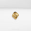 a close up of a gold ring on a white surface