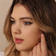 a woman with a nose piercing on her nose