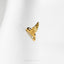 a close up of a gold ring with a bird on it