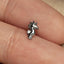 a close up of a person's finger with a ring on it