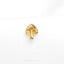 a gold plated brooch with a cross on it