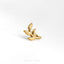 a gold ring with a leaf design on it