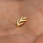 a gold ring with a leaf design on it