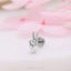 a close up of a ring with a peace sign on it