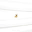 a gold ring with a leaf on top of it