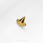 a close up of a gold ring on a white surface