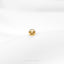 a gold ring with a smiley face on it