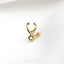 a gold nose ring with a curved nose