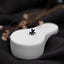 a close up of a white object with a black flower on it