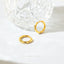 Minimalist hoop earrings – flat-lay gold