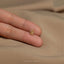 a person's hand with a gold ring on it