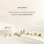 a white table topped with lots of gold rings