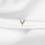 a white cloth with a gold deer head on it