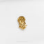 a gold colored pin with a jellyfish on it