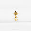 a gold star and crescent charm on a white background