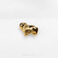 a gold brooch with a dog on it