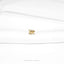 a close up of a white shirt with a gold bow on it