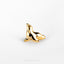 a close up of a gold ring on a white surface