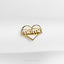 a gold pin with the word mama written in it