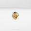 a close up of a gold ring on a white surface