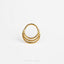 a stack of three rings sitting on top of a white surface