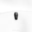 a black and white photo of a button on a white shirt