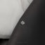 a close up of a bed with a white comforter