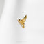 a close up of a gold ring with a bird on it