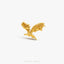 a gold plated dragon broochle on a white background