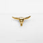 a gold bull&#39;s head on a white background