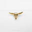 a gold bull&#39;s head on a white background