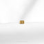 a yellow gold ring on a white cloth
