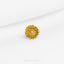 a close up of a gold ring on a white surface