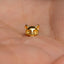 a gold cat shaped ring sitting on top of a person&#39;s hand