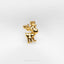 a gold brooch with a bear on it