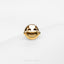 a gold ring with a smiley face on it