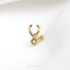 a gold nose ring with a curved nose