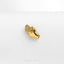 a gold brooch with a hand on it