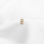 a close up of a ring on a white cloth