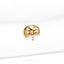 a close up of a gold brooch on a white cloth