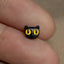 a close up of a person&#39;s finger with a cat&#39;s face on