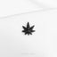 a black and white picture of a marijuana leaf